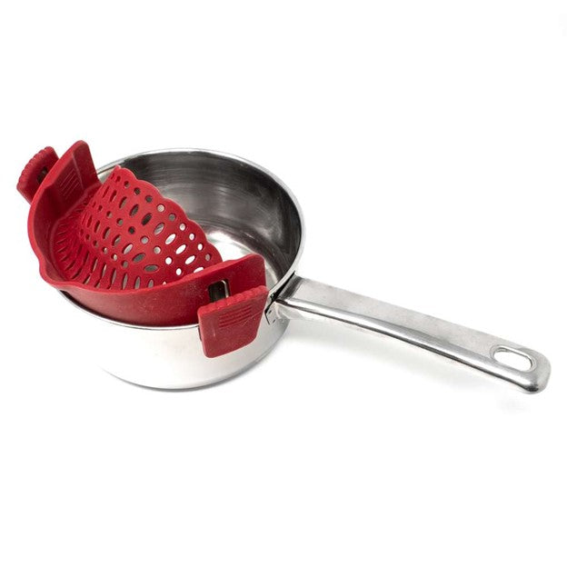 side view of red clip on pot strainer on silver stainless steel pot for kitchen