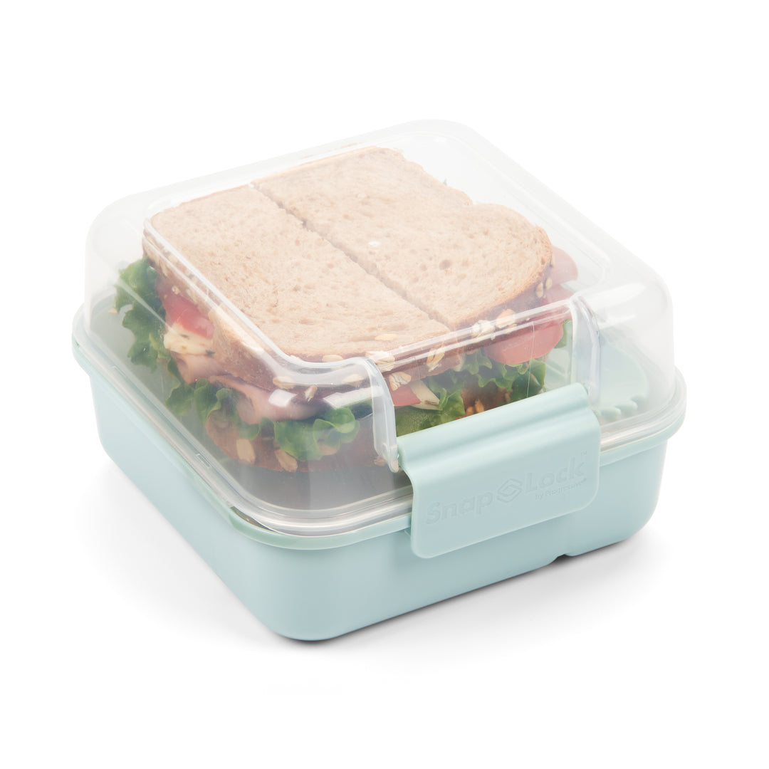 light blue food storage container with a lid for lunch with sandwich inside