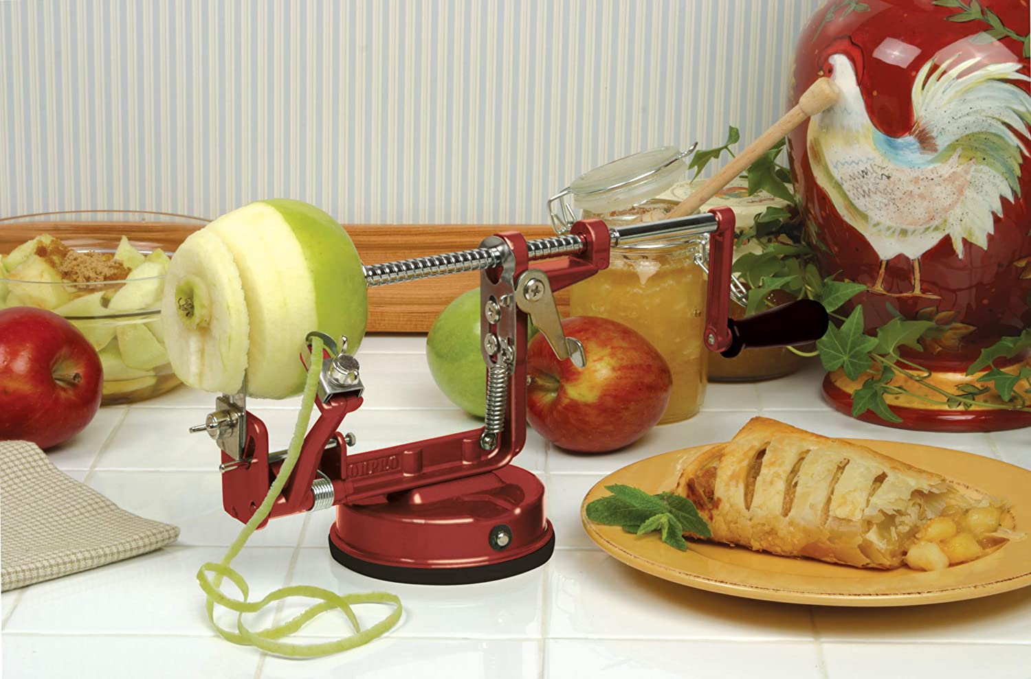 Apple peeler with clearance vacuum base