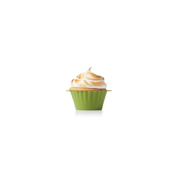 green silicone cupcake baking liner with vanilla cupcake and meringue frosting